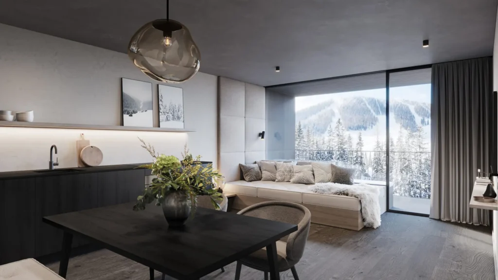 Cozy seating area overlooking the snowy mountains inside a luxury alpine hotel designed for modern hospitality.