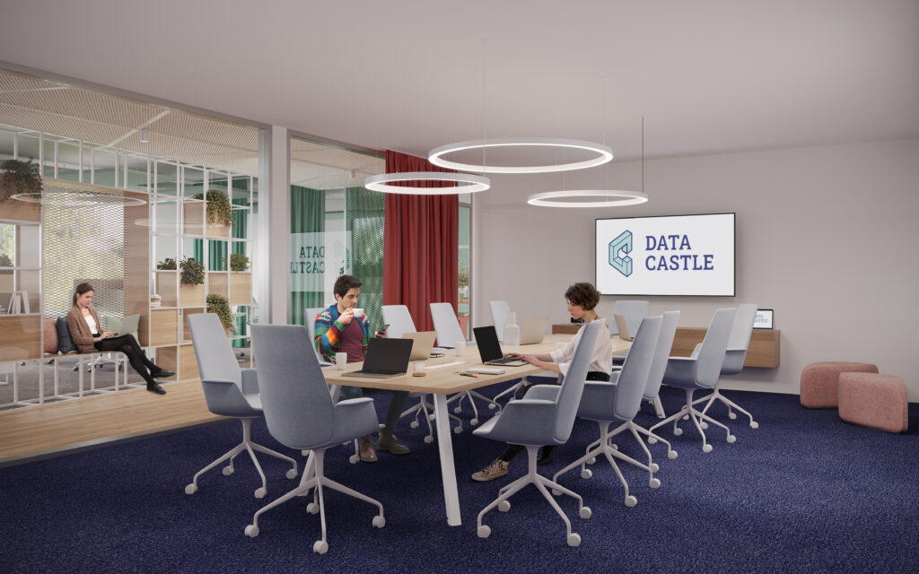 Modern data center conference room with a large meeting table, office chairs, and glass walls